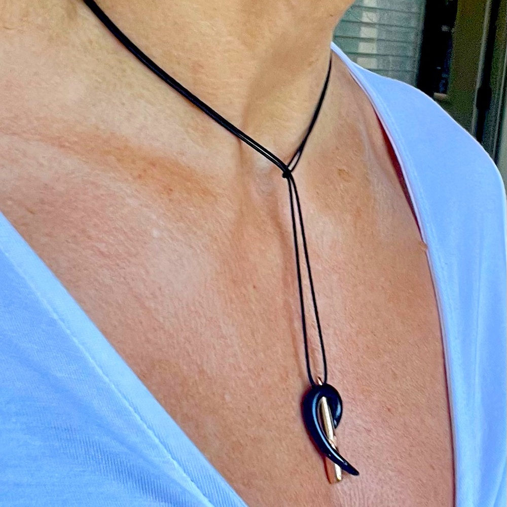 Necklace - a musical note, a modern interpretation. Unisex